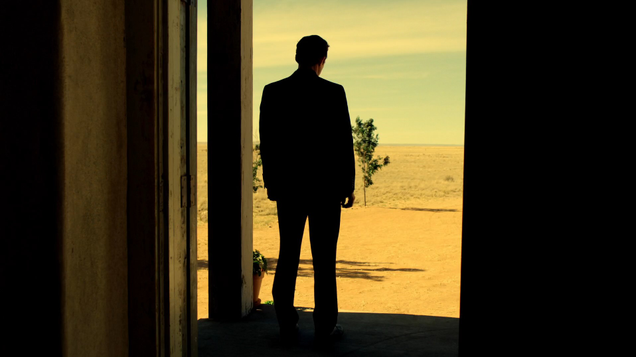 John Custer inside the symbol of civilization, staring out at the wild wastes.
